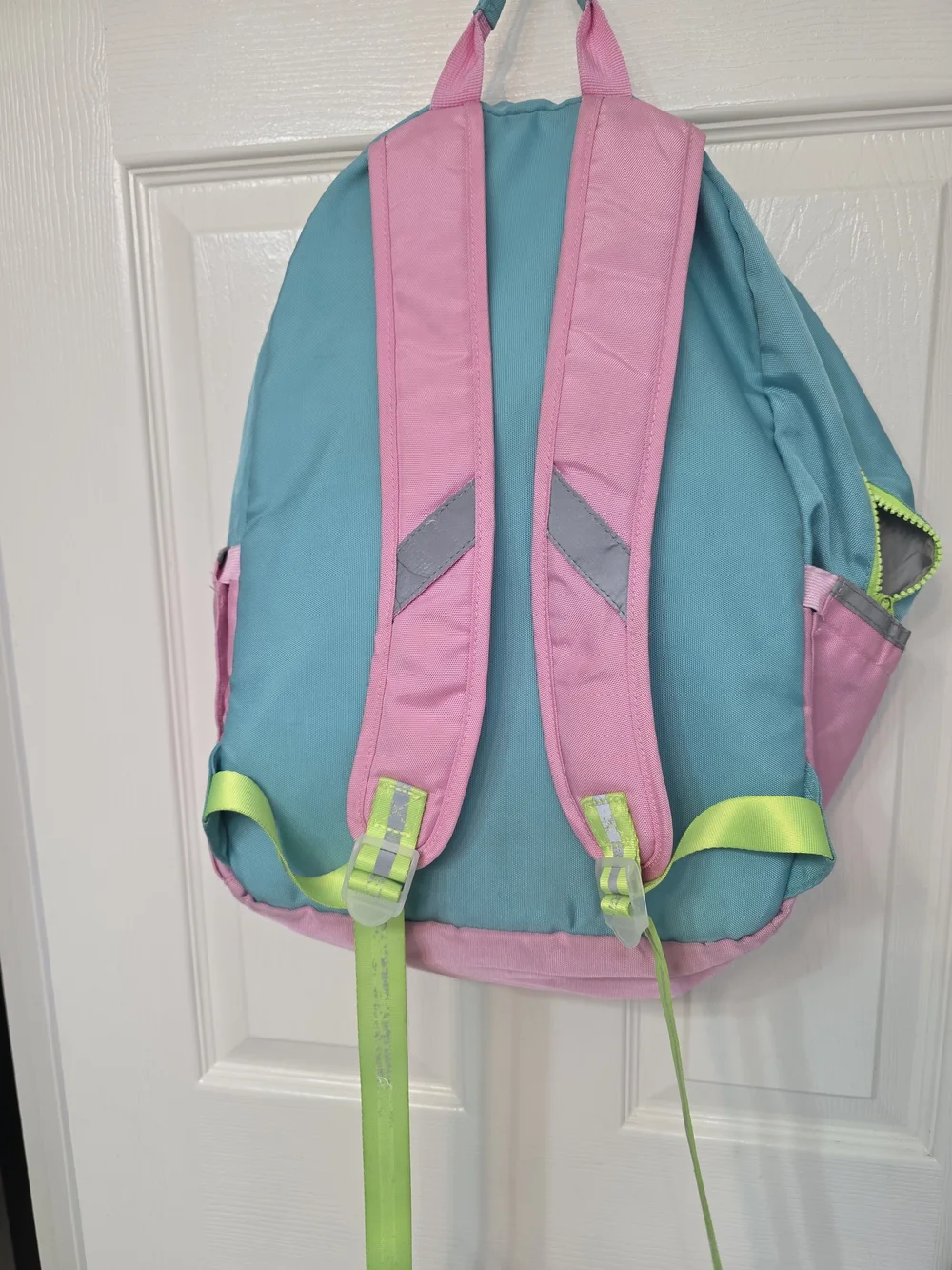 Pottery Barn Kids Astor Backpack featuring pink, aqua, and lime green colors.
